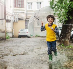 umbrella puddle kid baby
